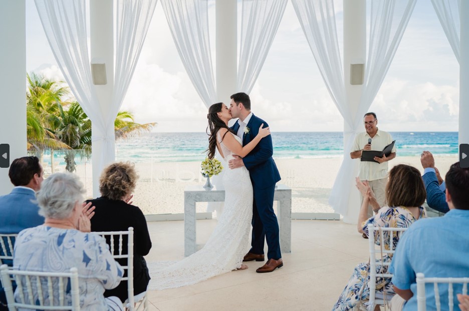 Wedding Couple at Ceremony in Ocean Front Gazebo 